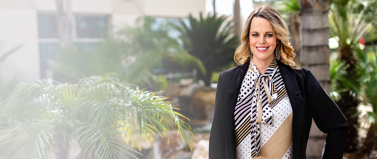 Julie Ann Baldwin with Palms at the Background